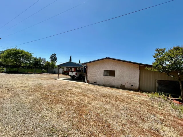 a house view with a outdoor space