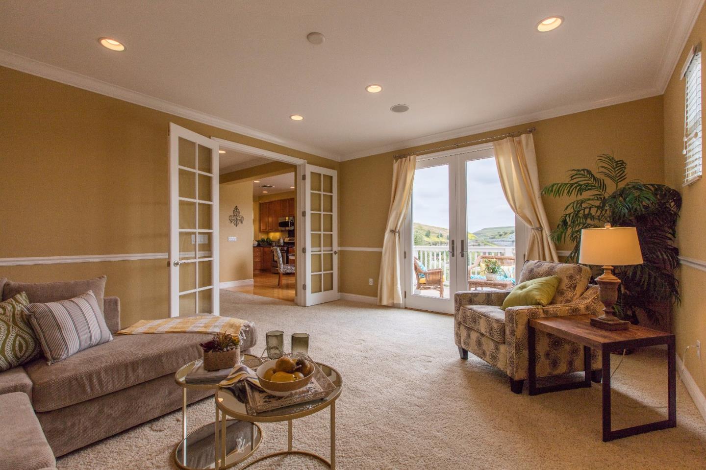 335 Ascente Commons San Jose, CA 95125 - Photo 12 of 38 a living room with furniture and floor to ceiling window