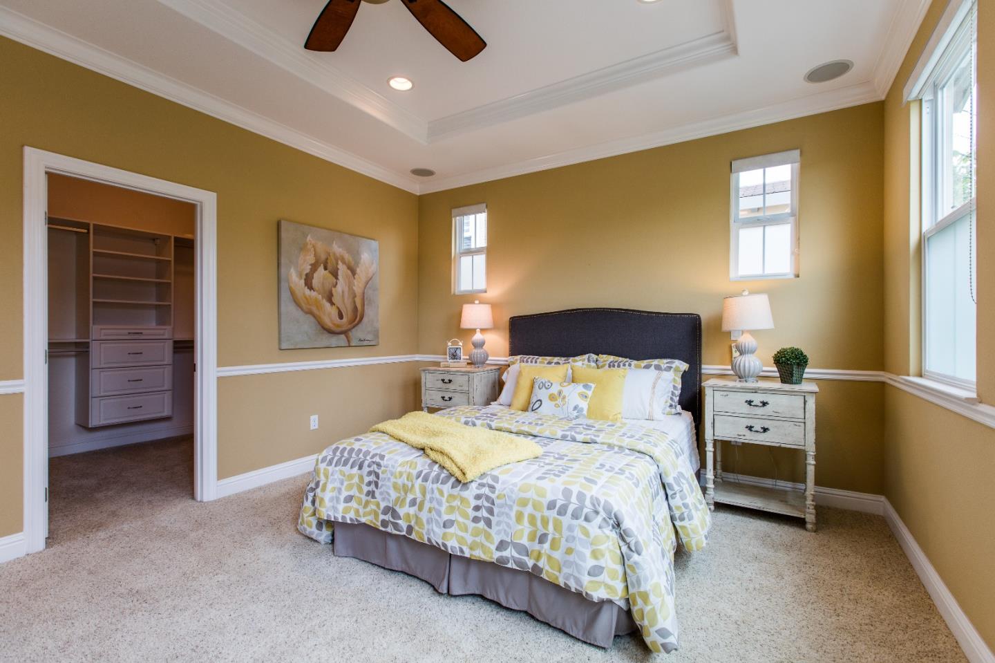 335 Ascente Commons San Jose, CA 95125 - Photo 15 of 38 a bedroom with a bed and a chandelier