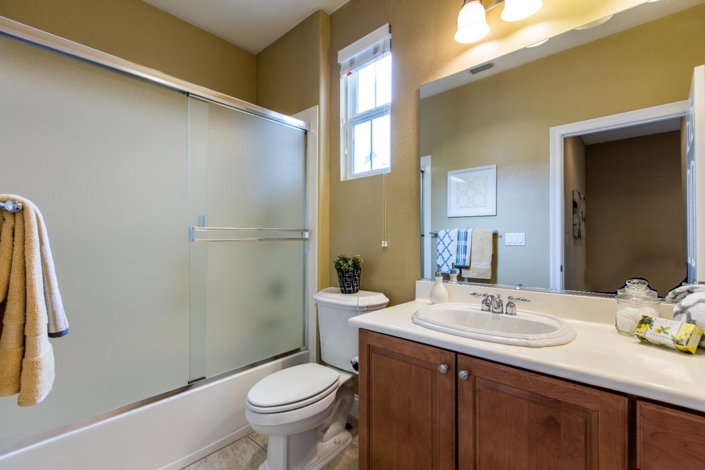 335 Ascente Commons San Jose, CA 95125 - Photo 23 of 38 a bathroom with a sink a toilet and shower