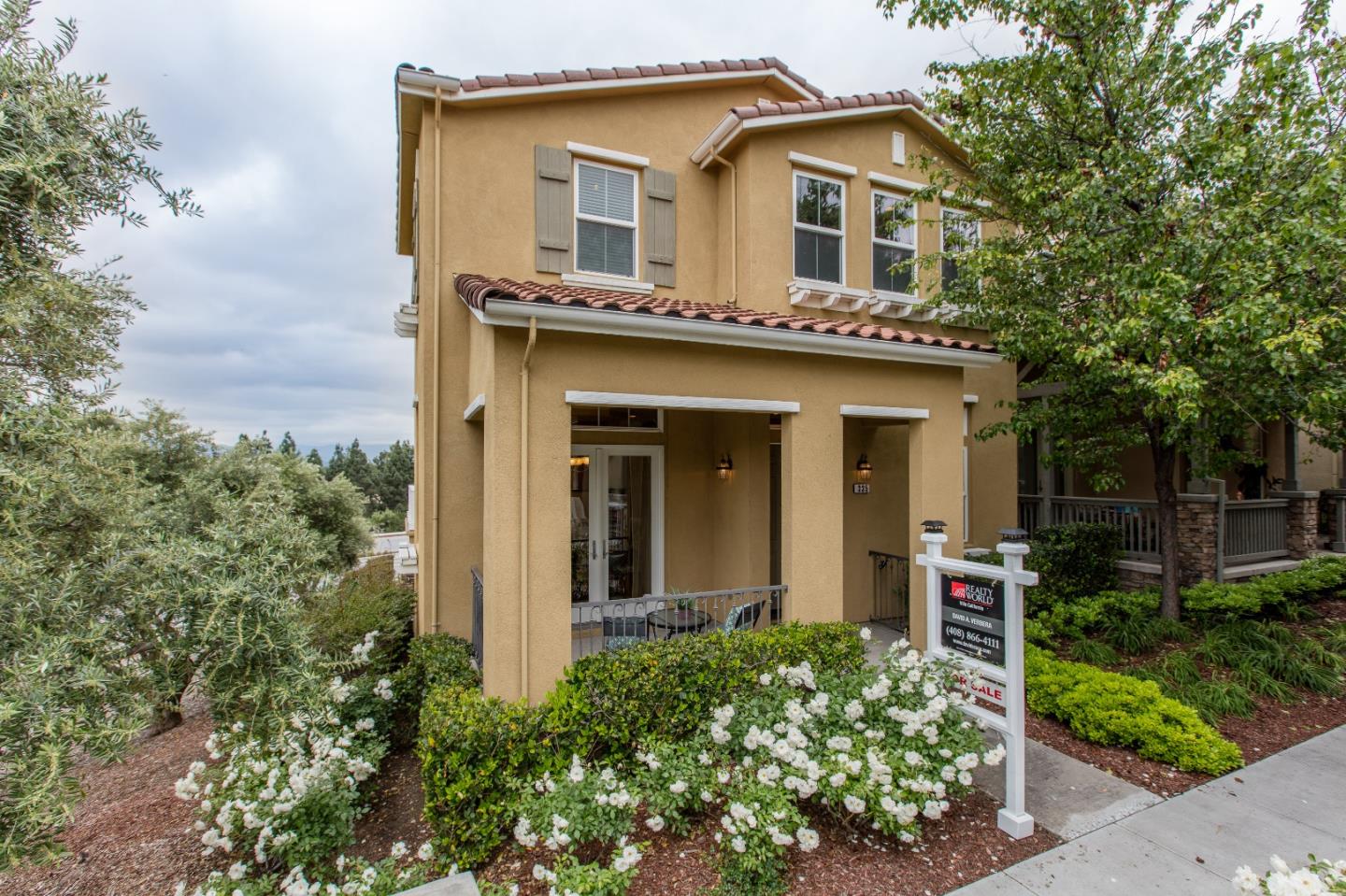 335 Ascente Commons San Jose, CA 95125 - Photo 36 of 38 front view of a house with a small yard