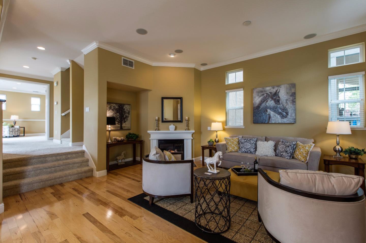 335 Ascente Commons San Jose, CA 95125 - Photo 4 of 38 a living room with furniture and a fireplace