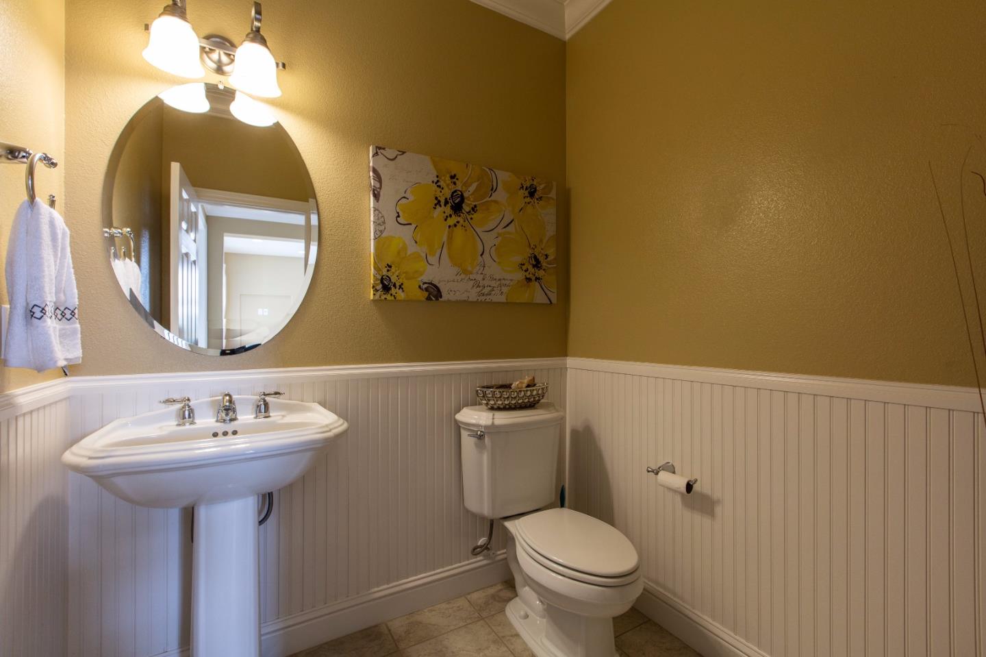 335 Ascente Commons San Jose, CA 95125 - Photo 10 of 38 a bathroom with a toilet sink and mirror