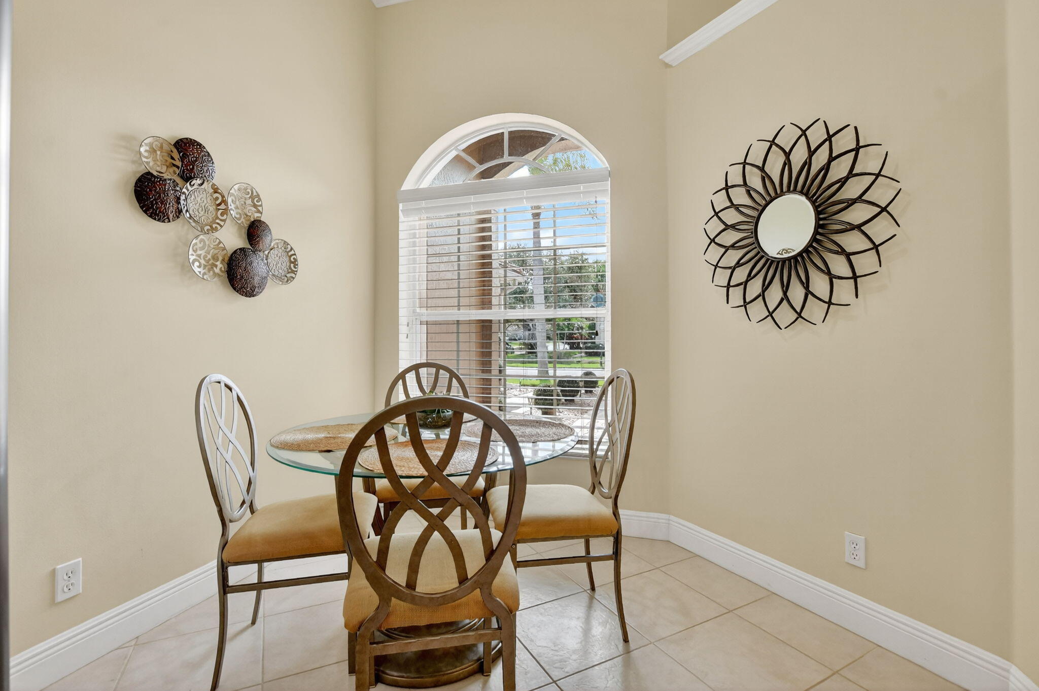 8451 Vía Serena Boca Raton, FL 33433 - Photo 15 of 28 a view of a dining room with furniture and wooden floor