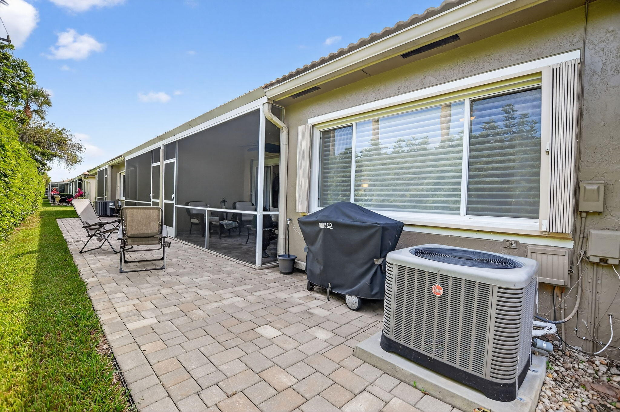 8451 Vía Serena Boca Raton, FL 33433 - Photo 18 of 28 a view of house with backyard and sitting area