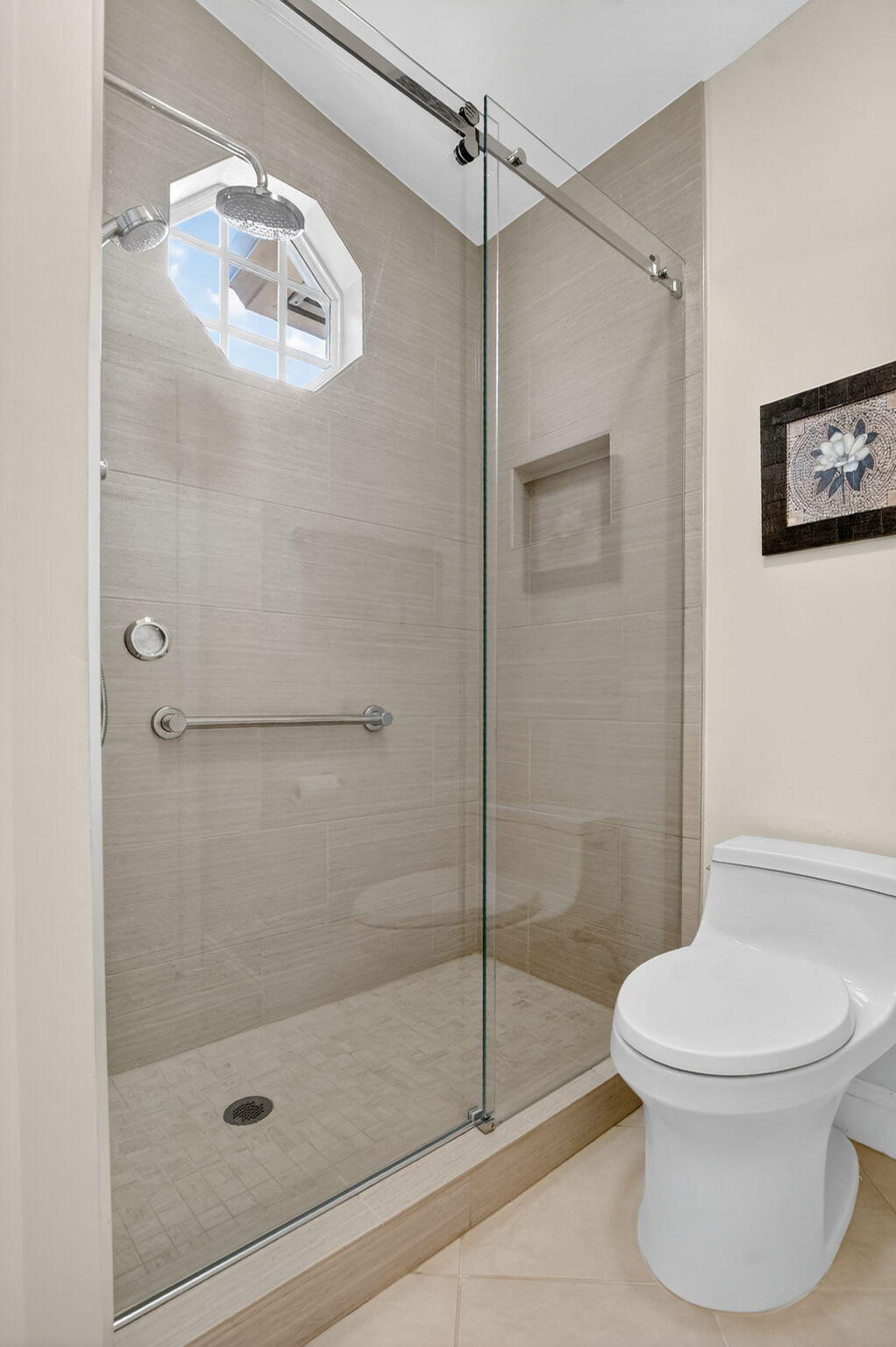 8451 Vía Serena Boca Raton, FL 33433 - Photo 8 of 28 a bathroom with a shower and a toilet