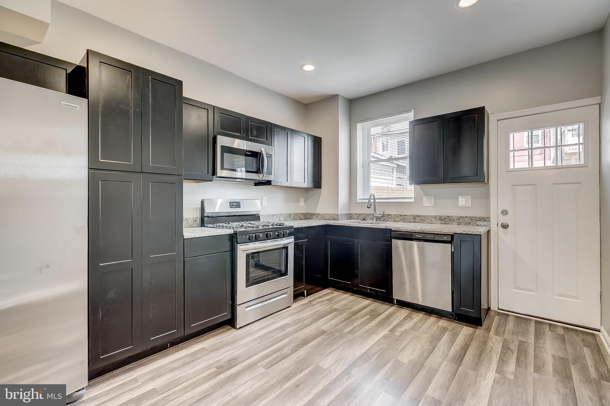 157 North Curley Street Baltimore, MD 21224 - Photo 2 of 30 Kitchen - Stainless Steel Appliances