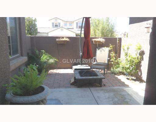849 Wintersweet Road Henderson, NV 89015 - Photo 3 of 18 Property Photo. Couryard, Pavers, Tropical Greenery
