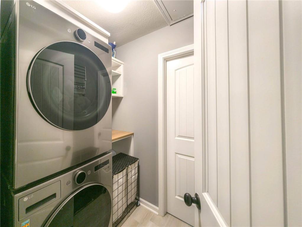 236 Camp Court Bethlehem, GA 30620 - Photo 43 of 51 a utility room with dryer and washer