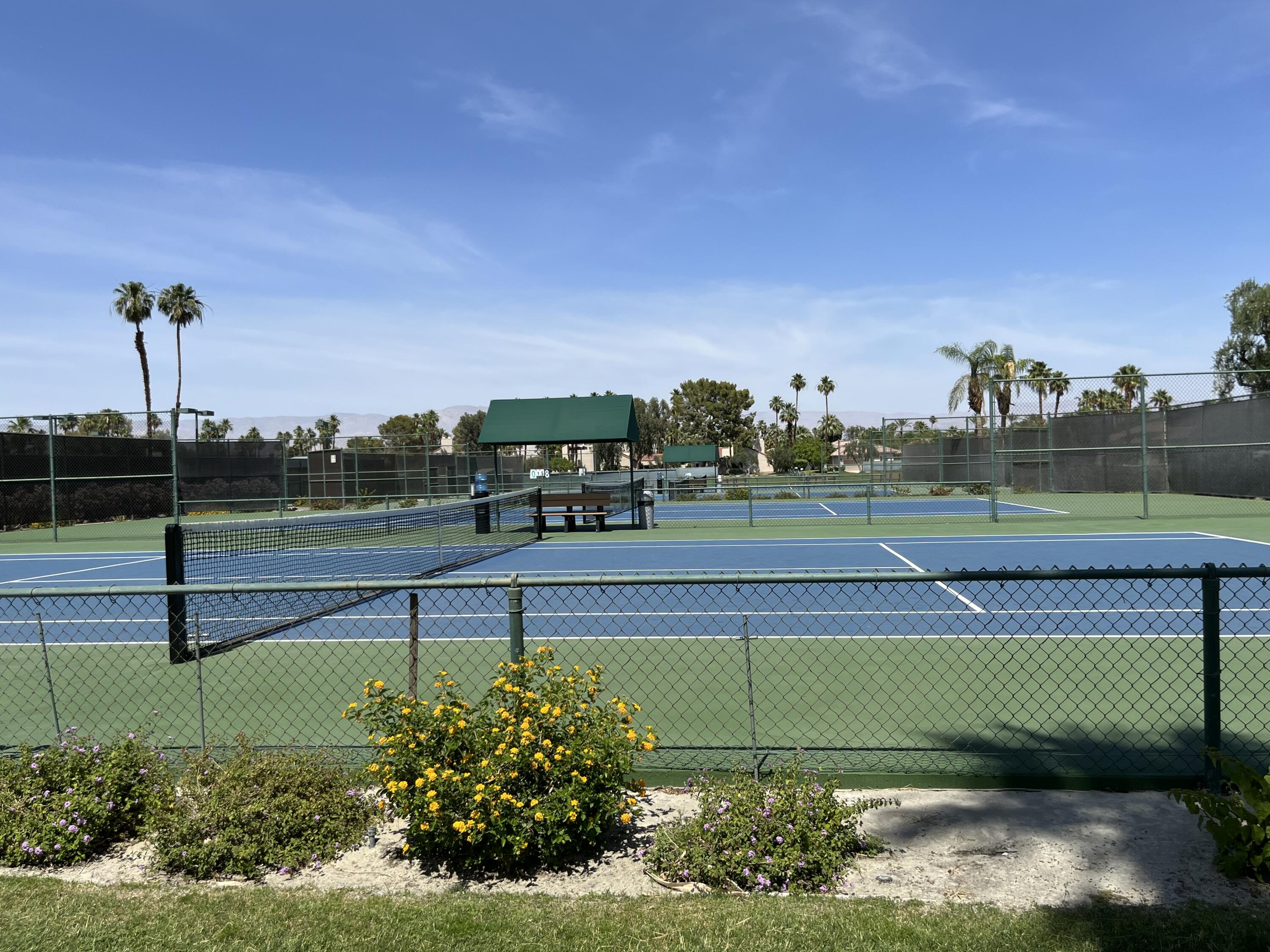 127 South Racquet Club Drive Rancho Mirage, CA 92270 - Photo 25 of 25 a view of a tennis court