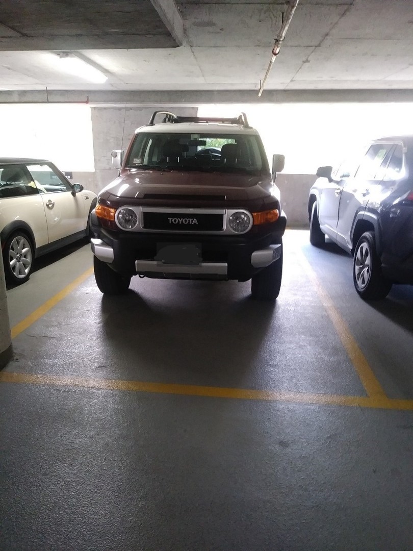 1212 North LaSalle Drive, Unit P313 Chicago, IL 60610 - Photo 3 of 3 a view of parking garage with cars parked
