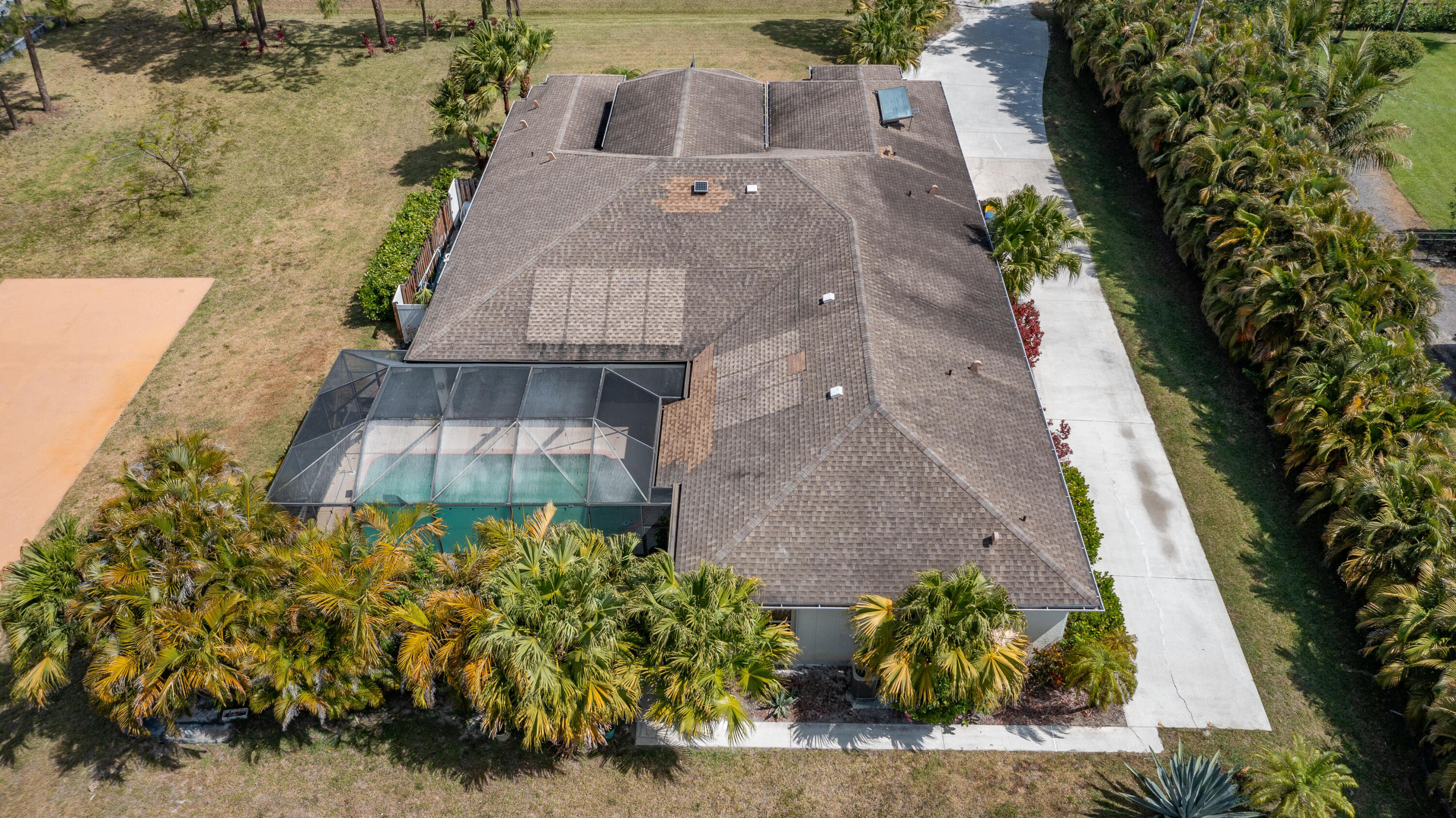 13554 86th Road North West Palm Beach, FL 33412 - Photo 11 of 58 an aerial view of a house with a yard