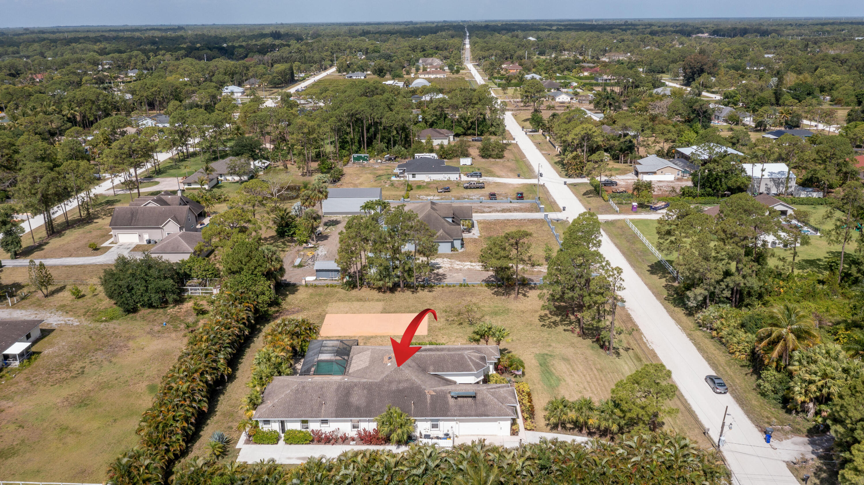 13554 86th Road North West Palm Beach, FL 33412 - Photo 23 of 58 an aerial view of residential houses with outdoor space