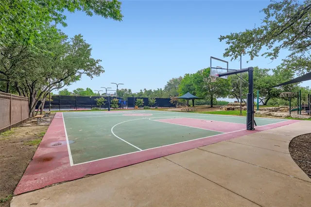a view of a swimming pool with a patio