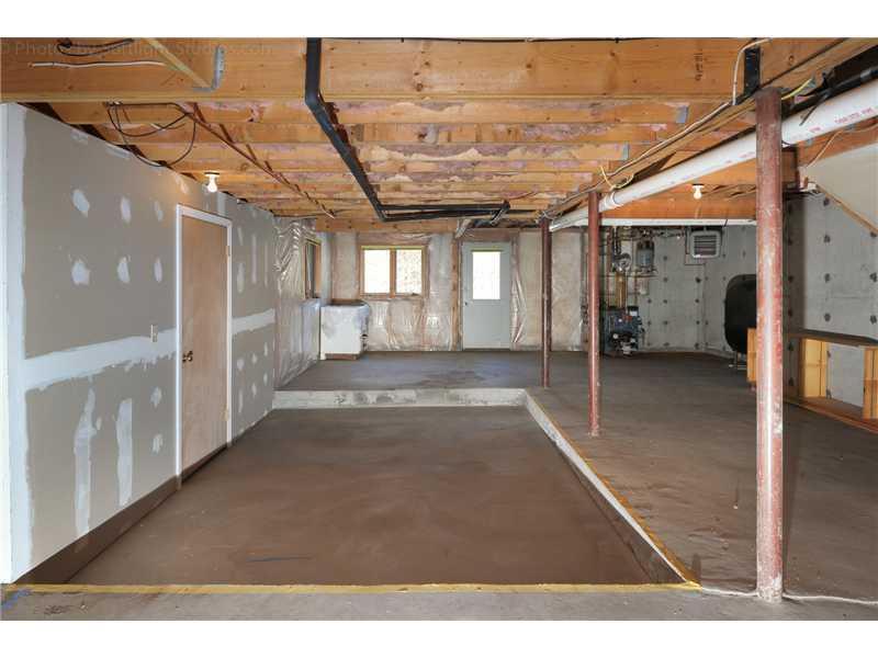 104 Bluff Road, Unit 104 Yarmouth, ME 04096 - Photo 27 of 28 Basement. Walkout daylight basement...
