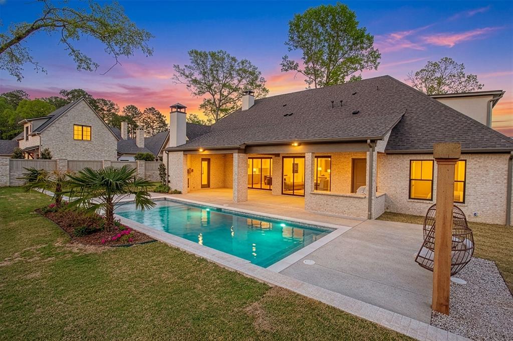 1839 Sentinel Way Tyler, TX 75703 - Photo 2 of 40 a view of a house with a swimming pool