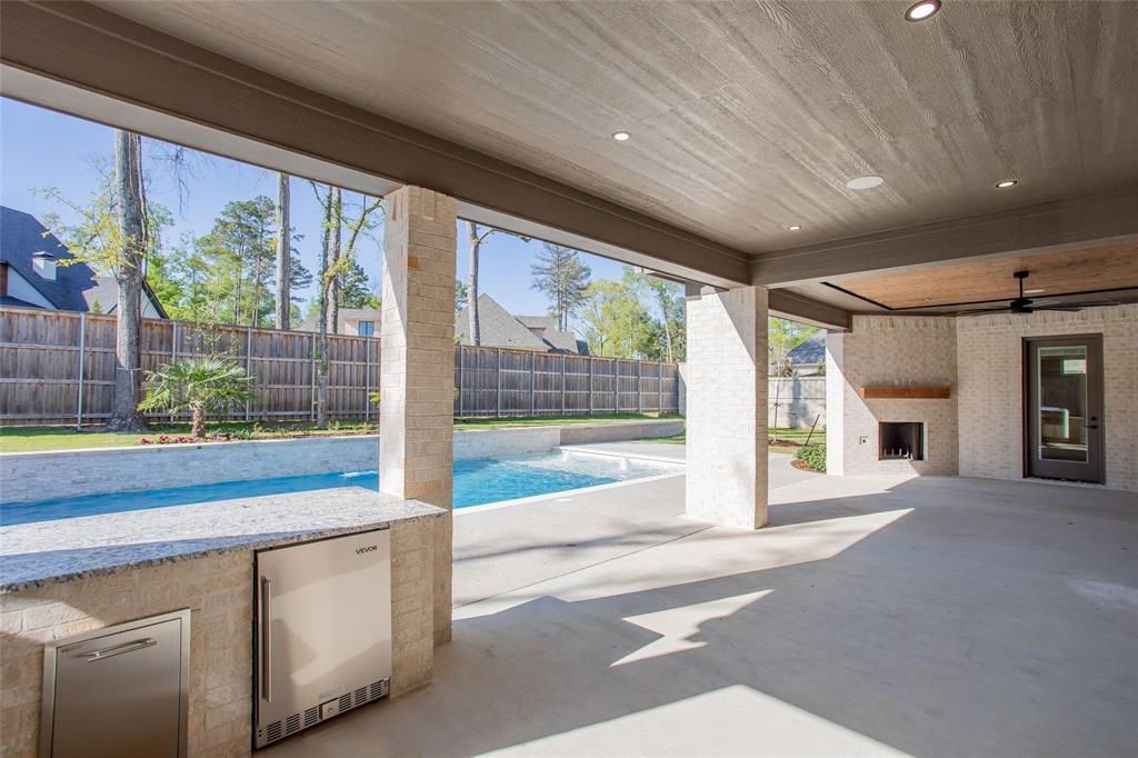 1839 Sentinel Way Tyler, TX 75703 - Photo 36 of 40 a view of a porch with furniture and floor to ceiling window