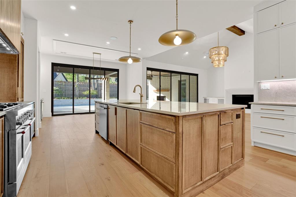 1839 Sentinel Way Tyler, TX 75703 - Photo 5 of 40 a kitchen with counter top space cabinets and outdoor view