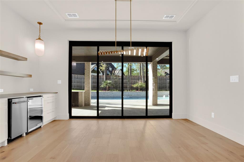 1839 Sentinel Way Tyler, TX 75703 - Photo 10 of 40 a view of an empty room with a fireplace