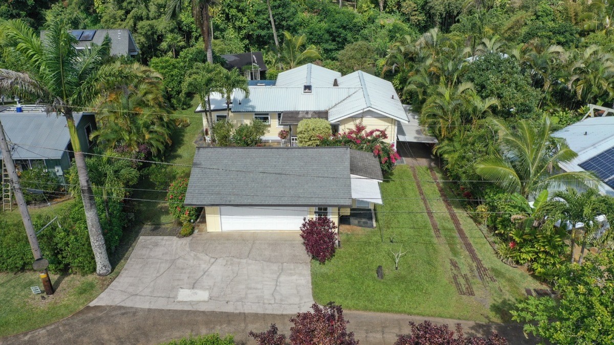 4378 Hookui Road Kilauea, HI 96754 - Photo 28 of 29 an aerial view of a house with a yard basket ball court and outdoor seating