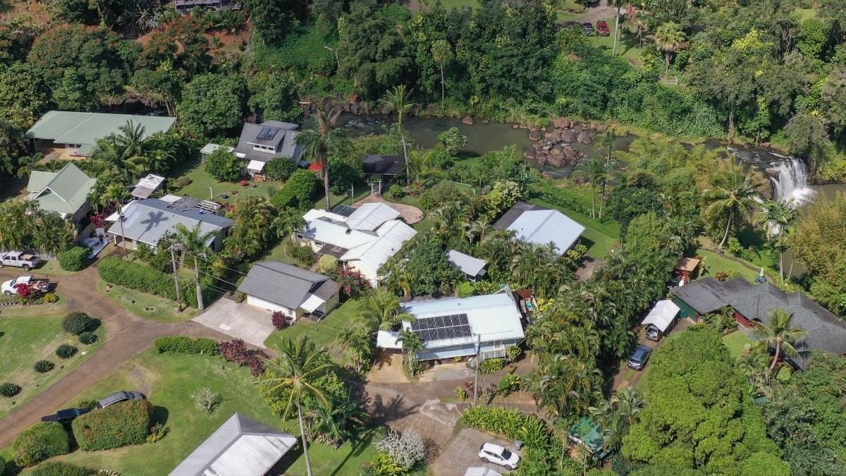 4378 Hookui Road Kilauea, HI 96754 - Photo 29 of 29 an aerial view of a house with a yard