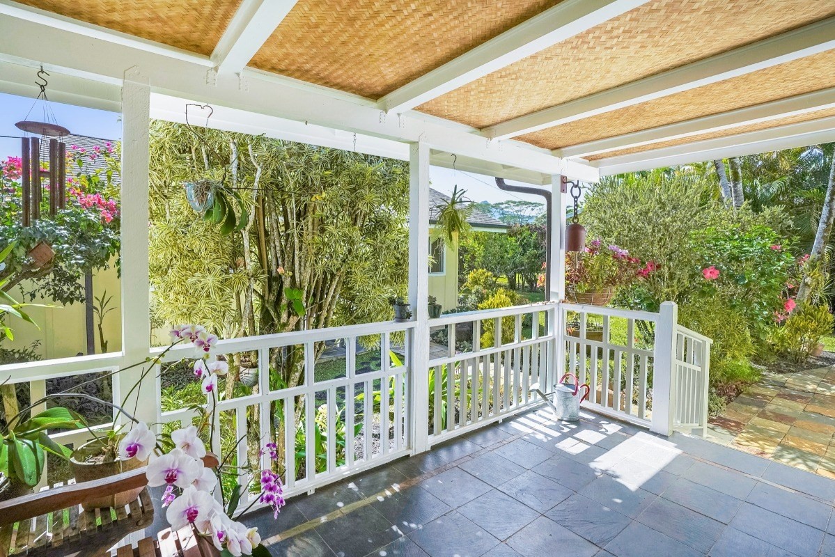 4378 Hookui Road Kilauea, HI 96754 - Photo 3 of 29 a view of a porch with wooden floor