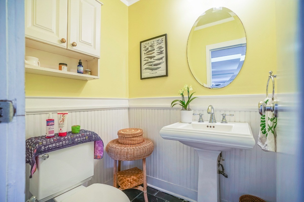 4378 Hookui Road Kilauea, HI 96754 - Photo 8 of 29 a bathroom with a sink and a mirror