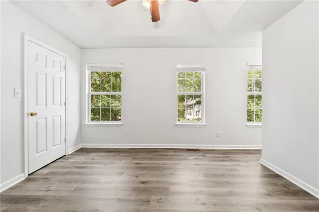 an empty room with windows