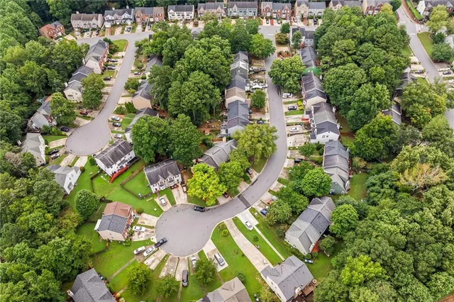 an aerial view of residential house with outdoor space