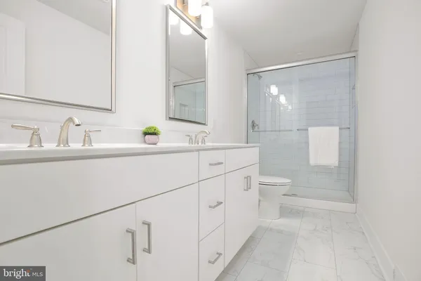 a view of a small space with wooden floor