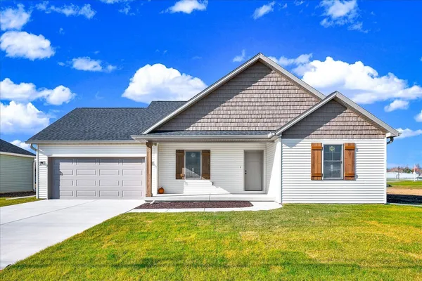 a front view of house with yard