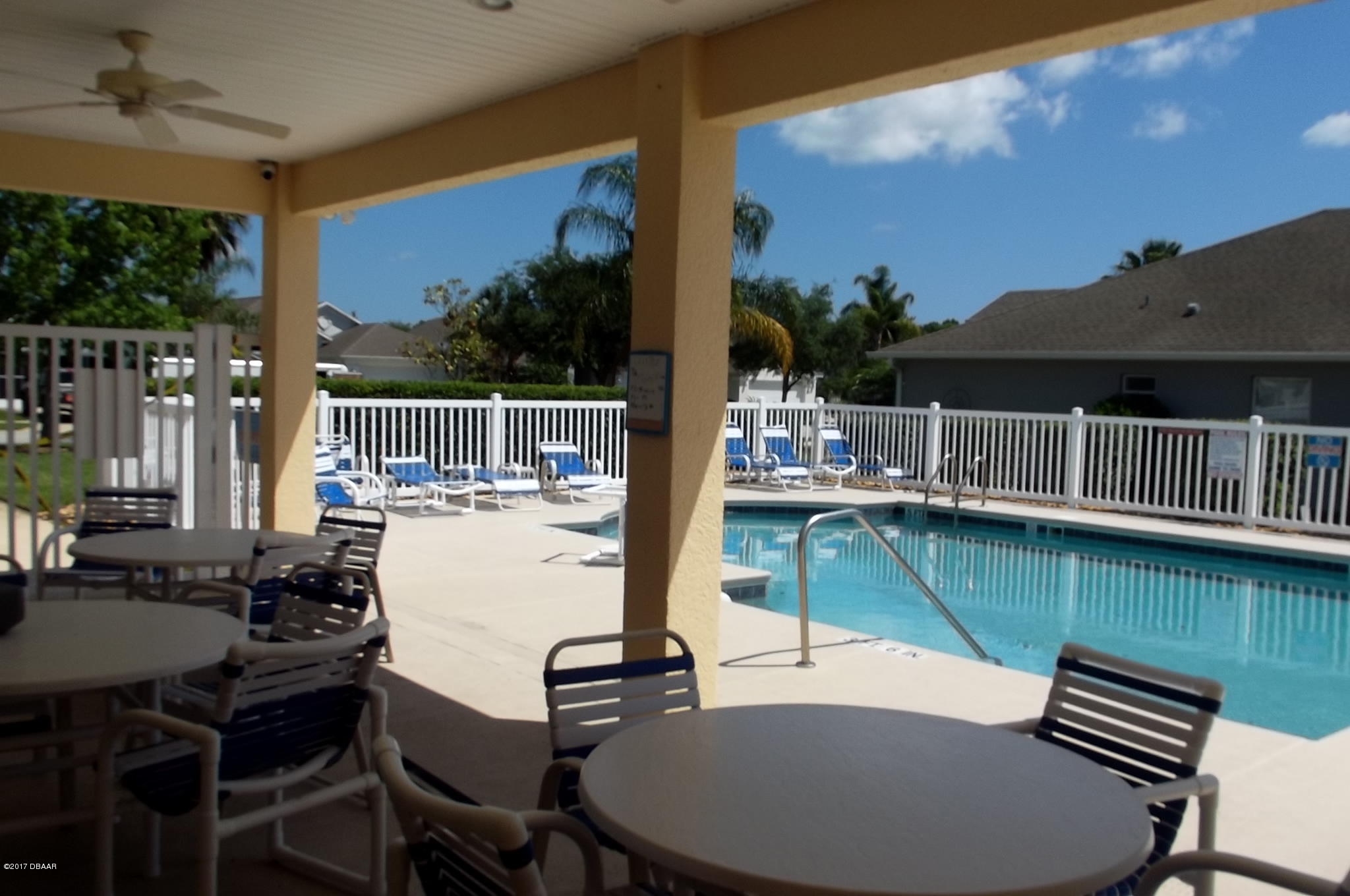 812 Star Reef Lane Edgewater, FL 32132 - Photo 15 of 17 a balcony with table and chairs