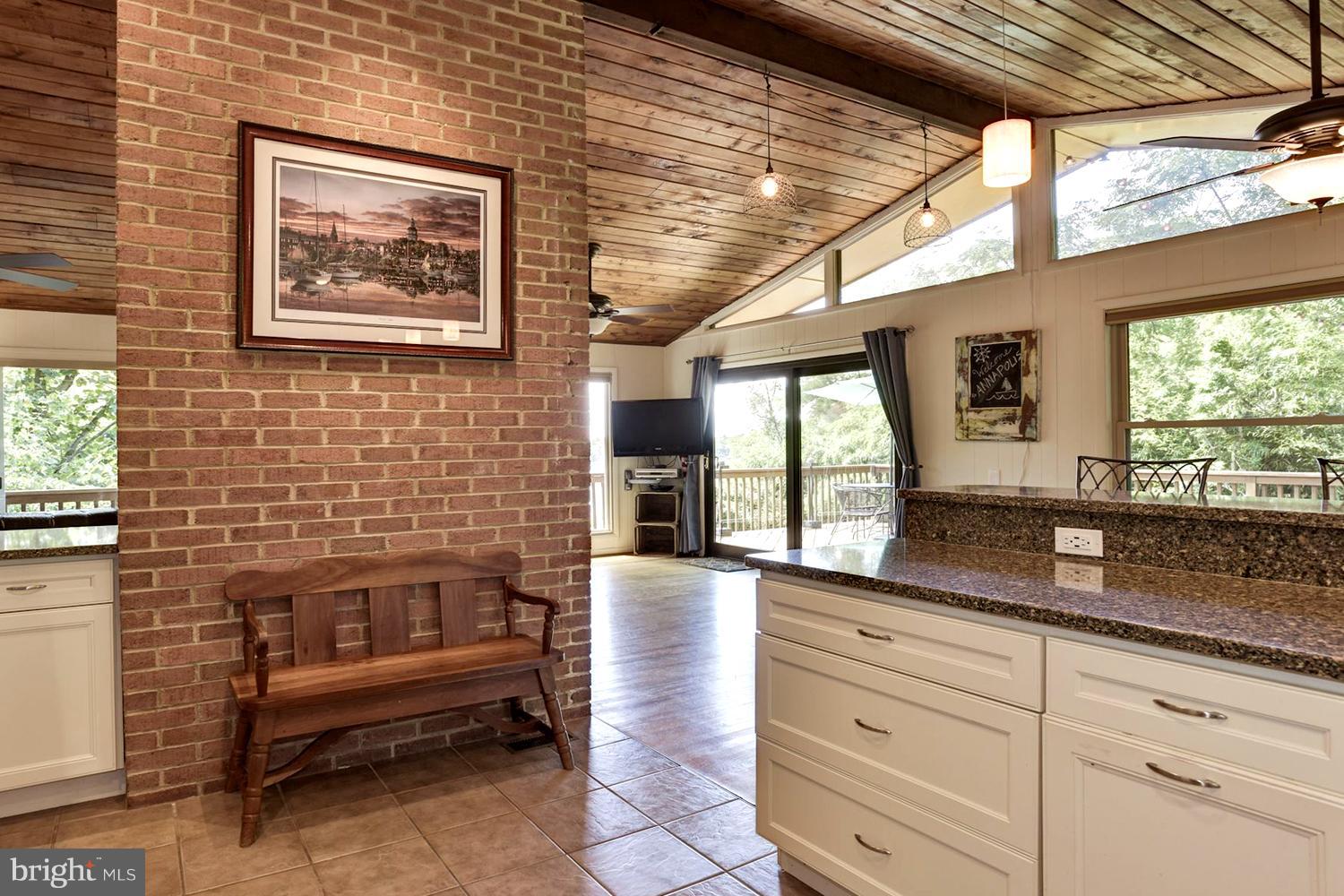 1607 Riverside Drive Annapolis, MD 21409 - Photo 14 of 30 Rich Textures of Hardwoods / Glass and Brick