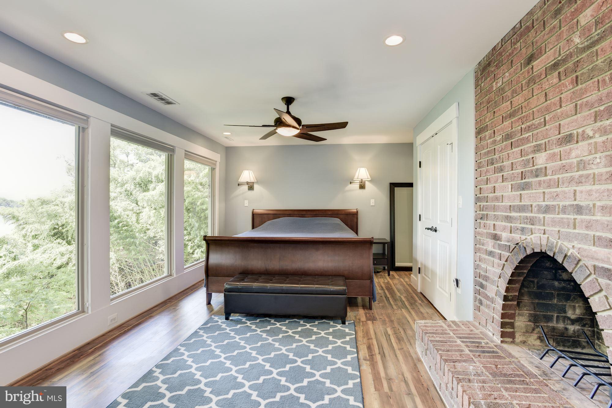 1607 Riverside Drive Annapolis, MD 21409 - Photo 17 of 30 Master Bedroom Haven with Fireplace