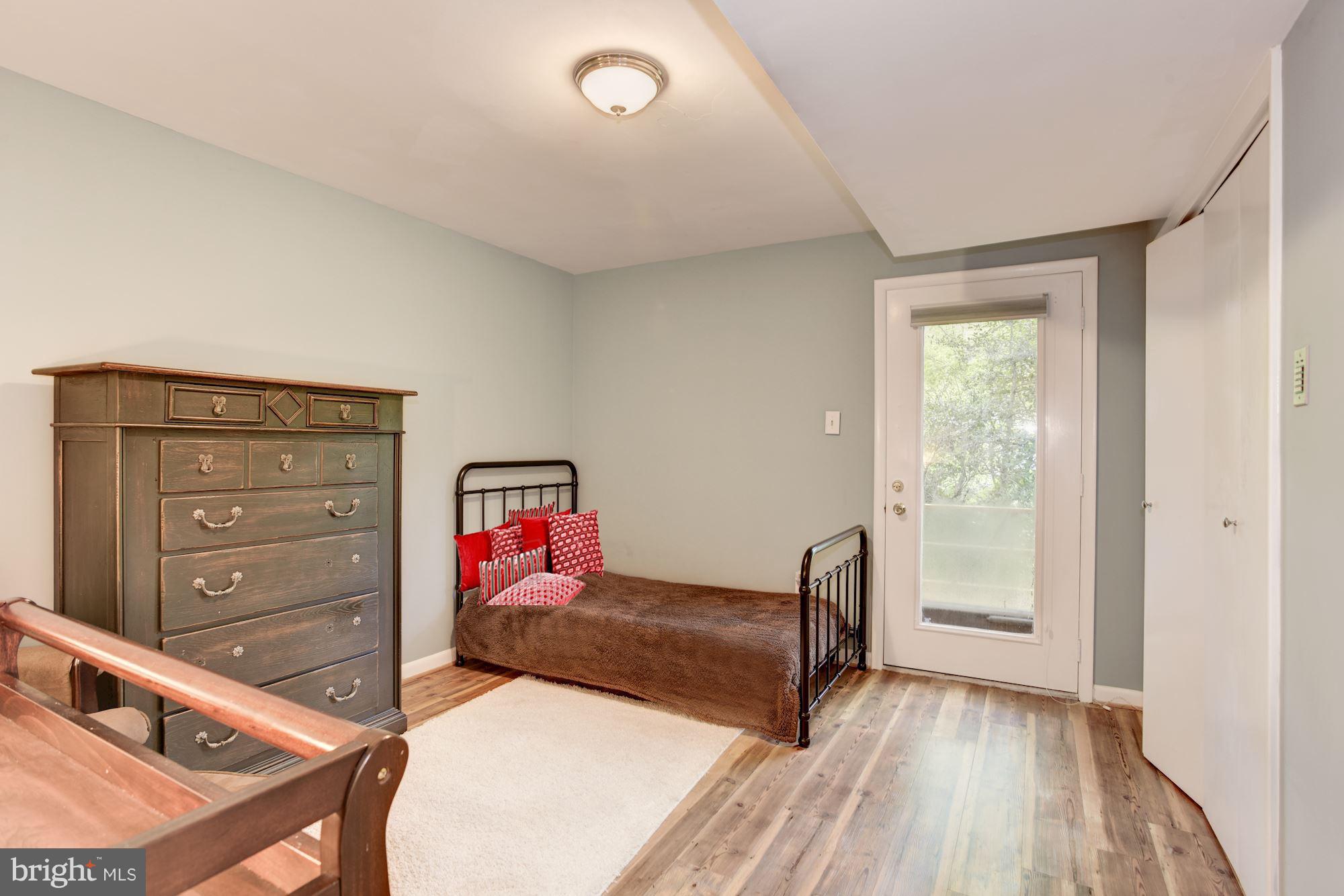 1607 Riverside Drive Annapolis, MD 21409 - Photo 22 of 30 Lower Level 3rd Bedroom Spilling Out to Deck