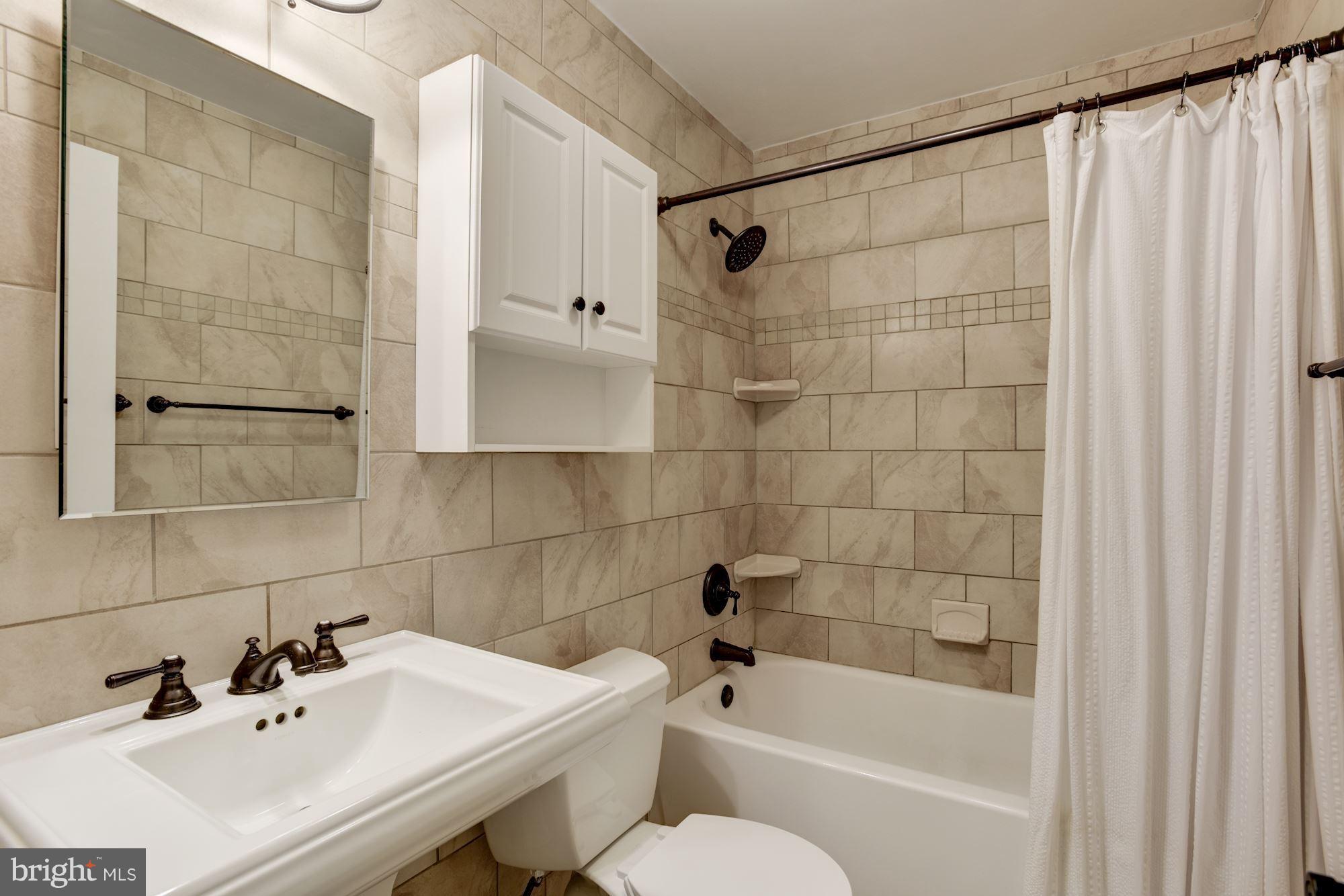 1607 Riverside Drive Annapolis, MD 21409 - Photo 26 of 30 Attractively Appointed and Tiled Shared Full Bath