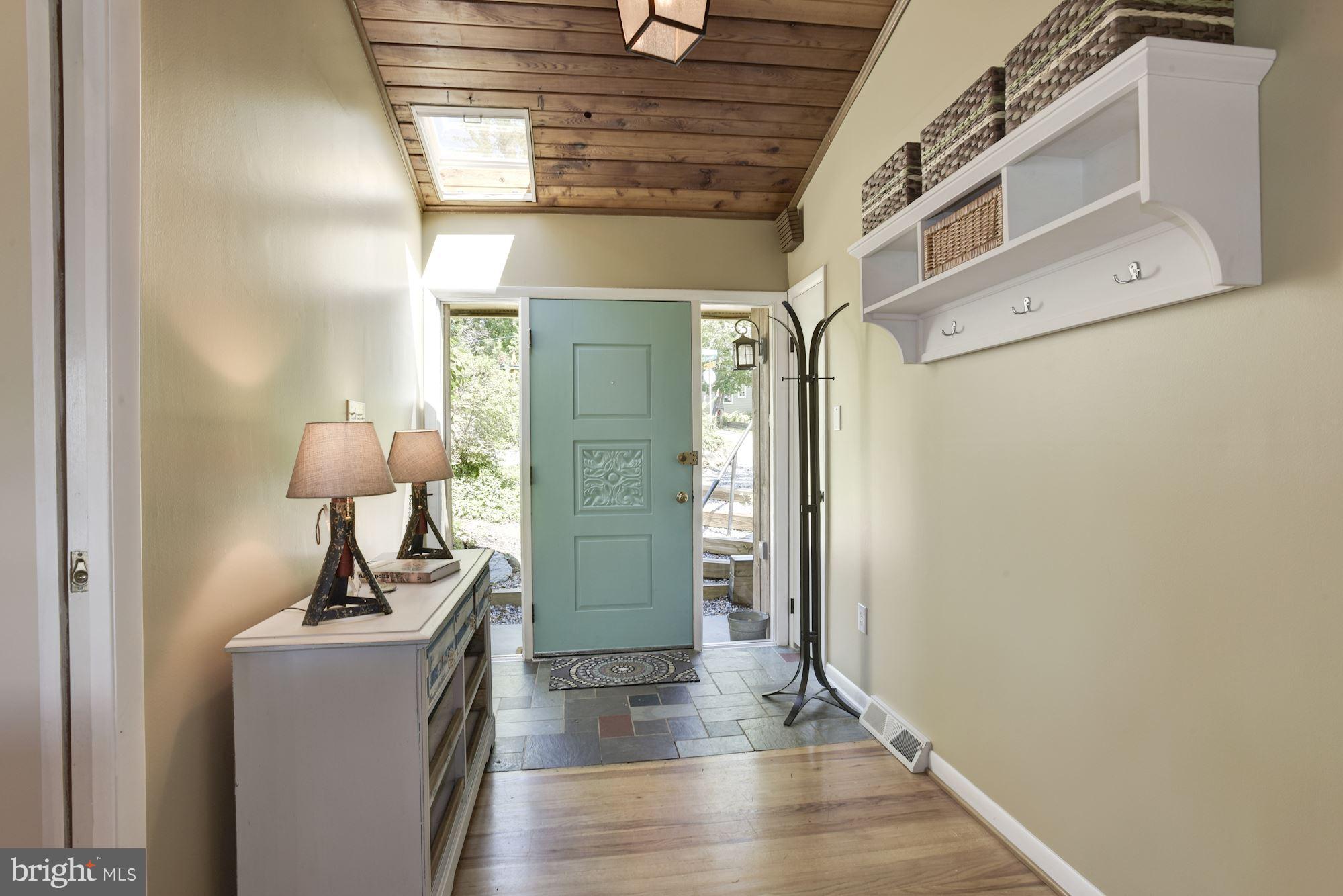 1607 Riverside Drive Annapolis, MD 21409 - Photo 7 of 30 Foyer Showcasing Wood Floors and Planked Ceiling