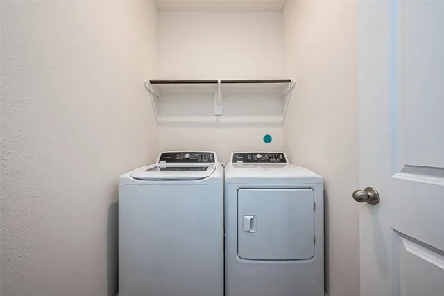 a bathroom with a bathtub and a toilet