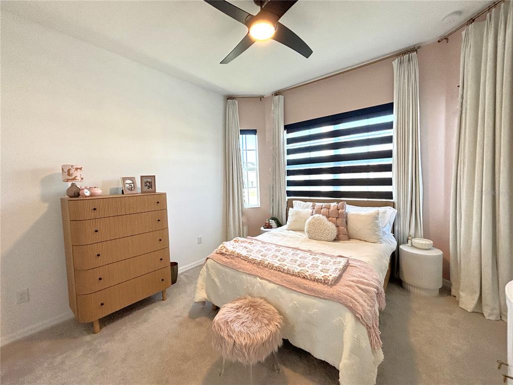 17510 Jadestone Court Venice, FL 34293 - Photo 16 of 46 a bedroom with a bed and a window