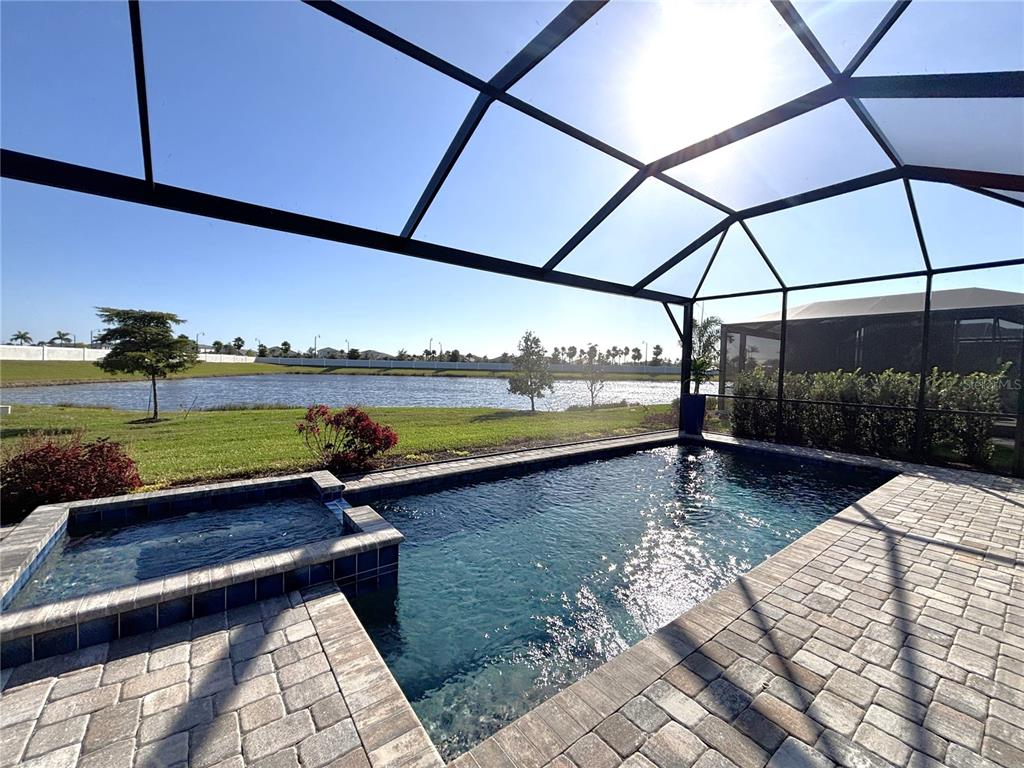 17510 Jadestone Court Venice, FL 34293 - Photo 21 of 46 a view of a lake with a big yard