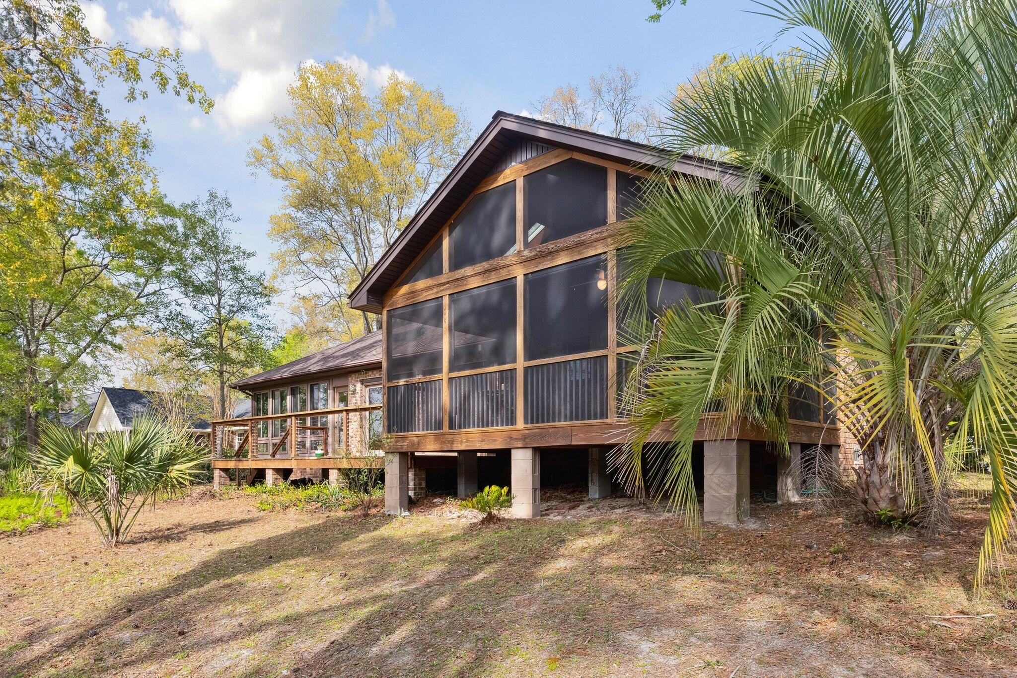 636 Cain Drive Mount Pleasant, SC 29464 - Photo 33 of 37 Exterior of screened porch