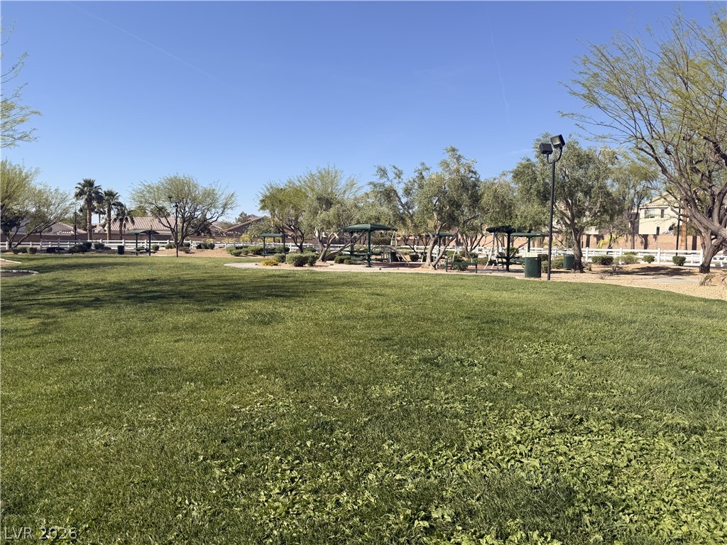 8909 Houston Ridge Avenue Las Vegas, NV 89178 - Photo 45 of 50 A well-maintained park area featuring ample green space and inviting picnic spots.