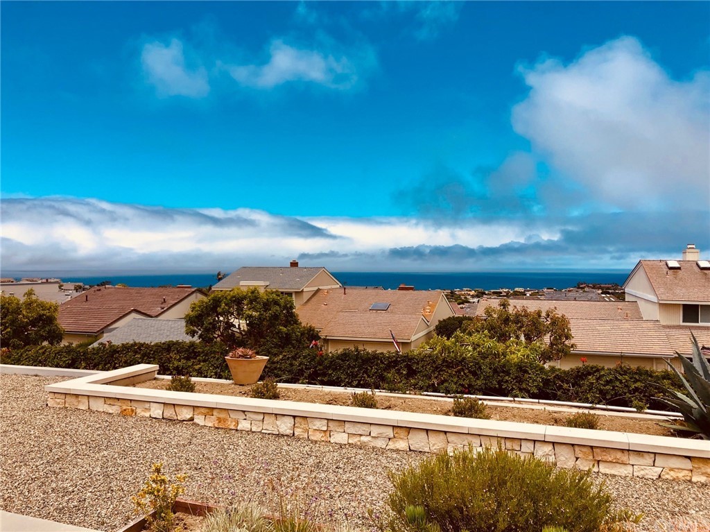a view of a balcony with an ocean view