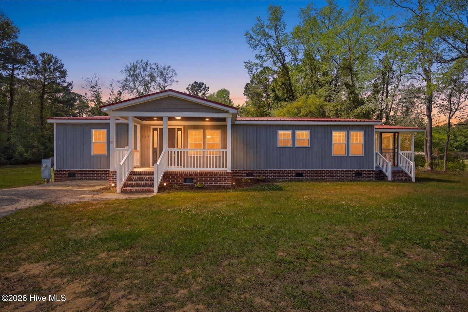 234 Bullard Road Chadbourn, NC 28431 - Photo 4 of 67 06-IMG_5809_twilight_e3df028f