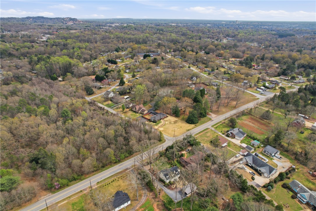 4304 Old Buncombe Road Greenville, SC 29617 - Photo 47 of 49 An aerial view captures the vastness of the lot, nestled amidst a thriving community.