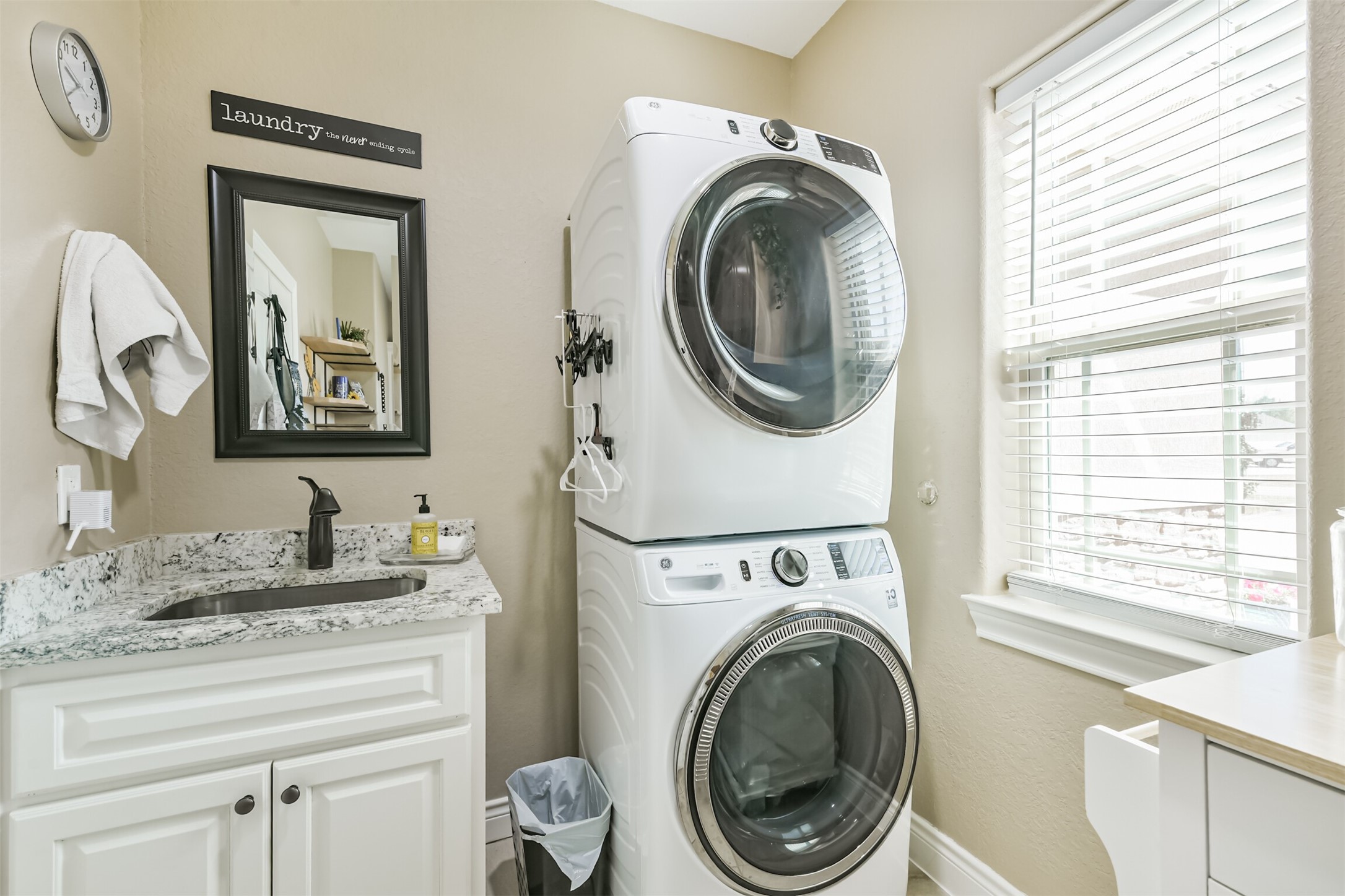 27553 Rio Blanco Drive Splendora, TX 77372 - Photo 14 of 41 a room with a washer and dryer
