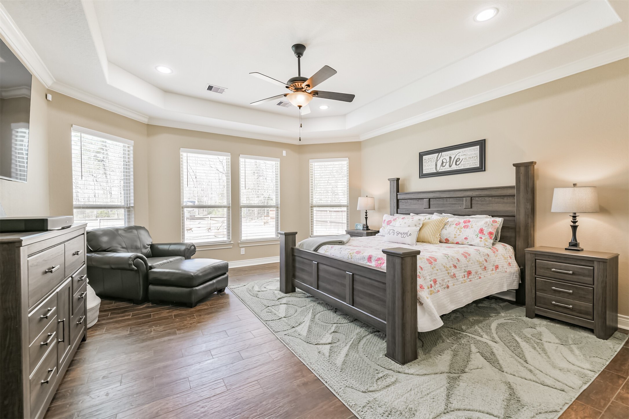 27553 Rio Blanco Drive Splendora, TX 77372 - Photo 25 of 41 a bedroom with a bed and a couch