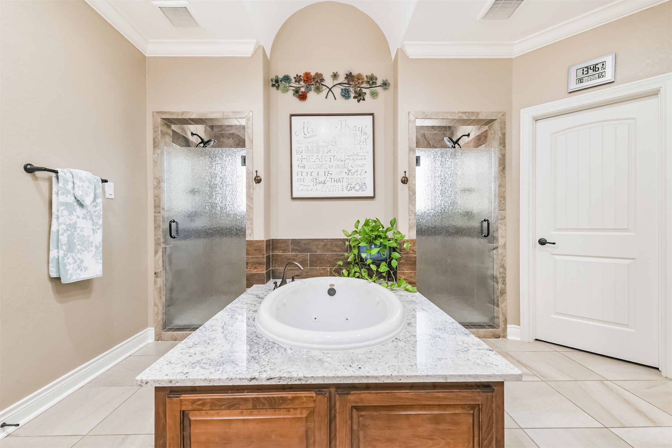 27553 Rio Blanco Drive Splendora, TX 77372 - Photo 27 of 41 a bathroom with a granite countertop sink a mirror and a shower