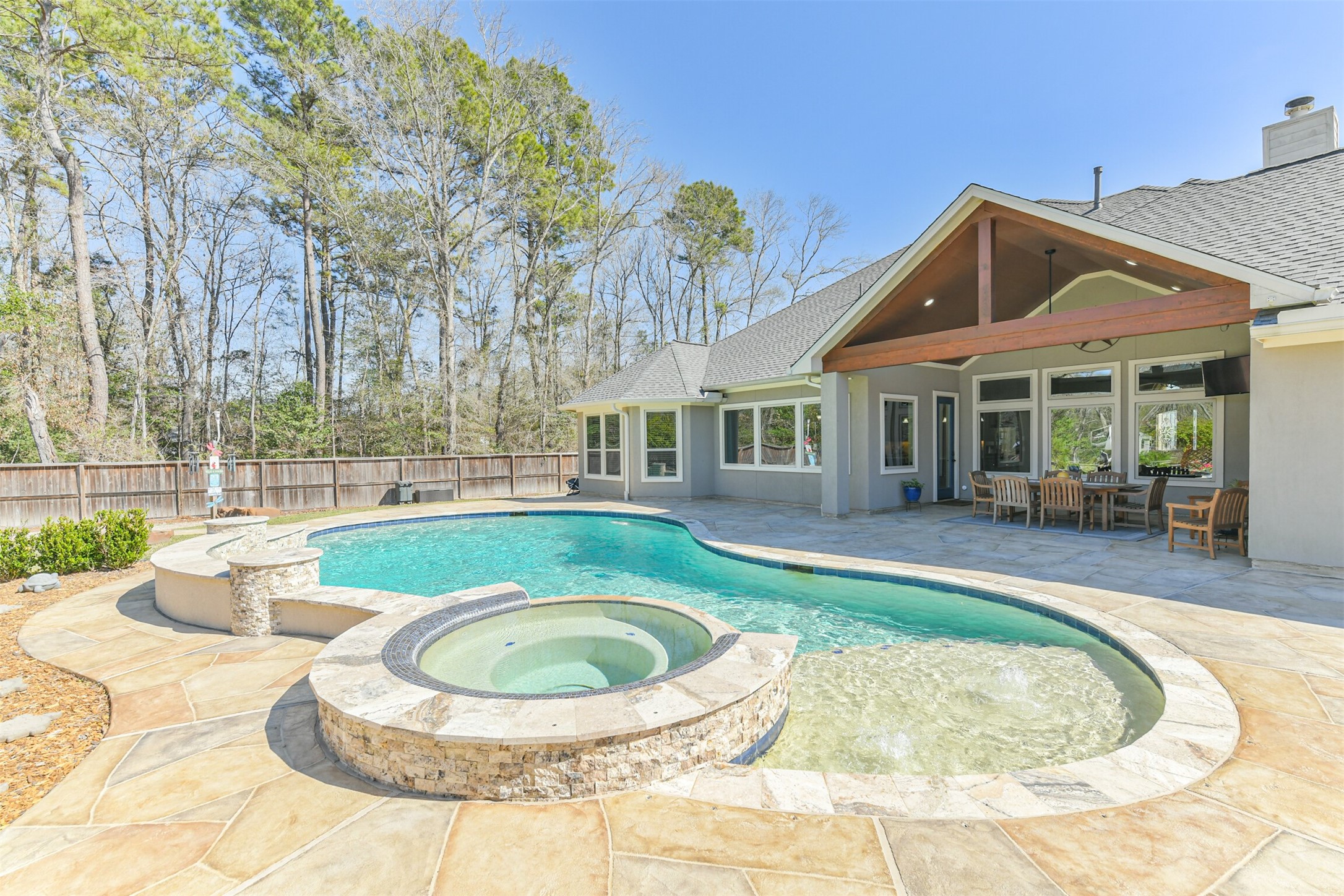 27553 Rio Blanco Drive Splendora, TX 77372 - Photo 32 of 41 a view of a house with swimming pool and porch