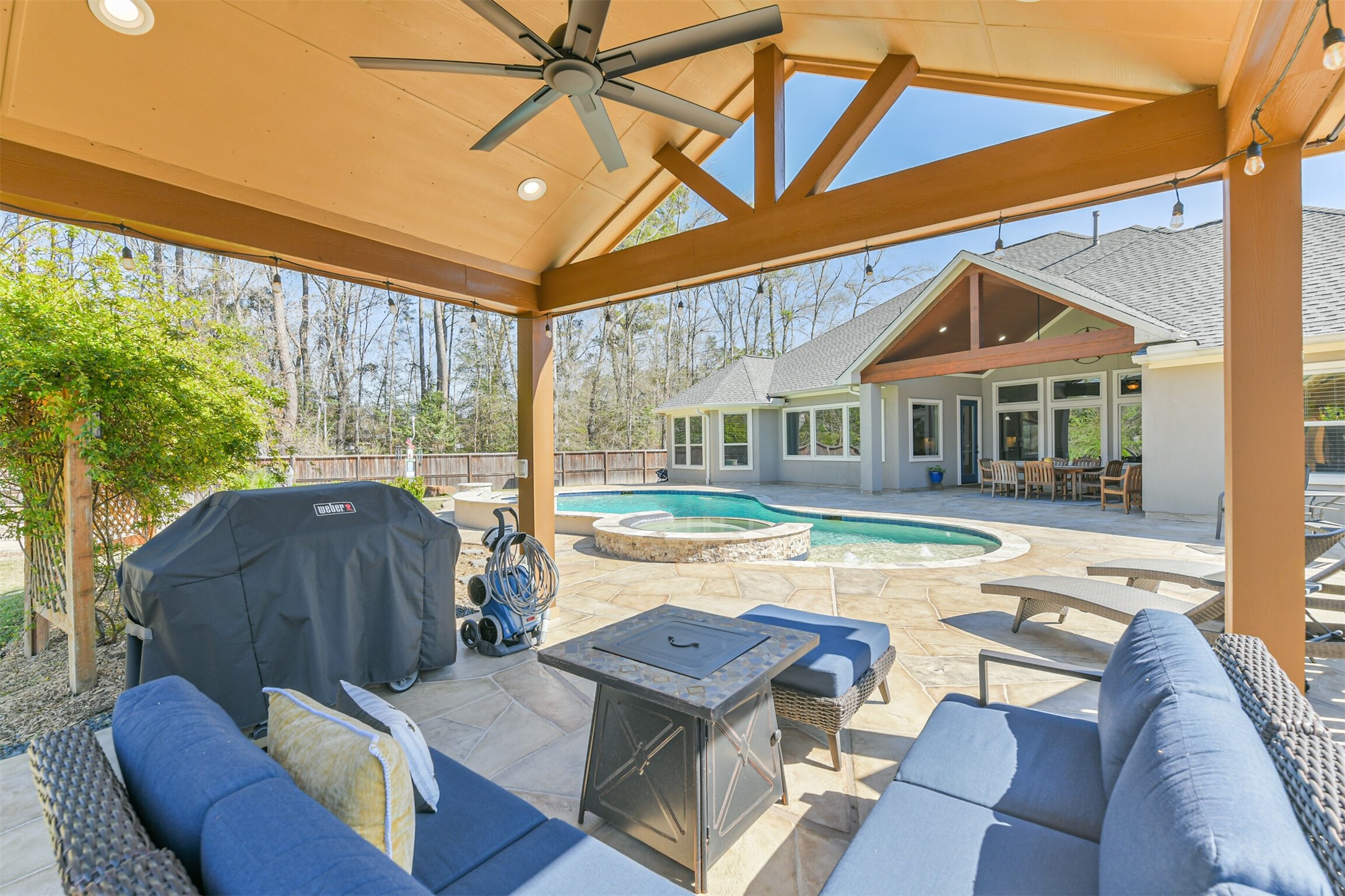 27553 Rio Blanco Drive Splendora, TX 77372 - Photo 34 of 41 a view of a house with backyard and sitting area
